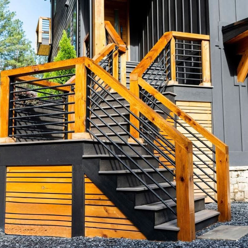 custom outdoor stairs leading to the main floor of a home