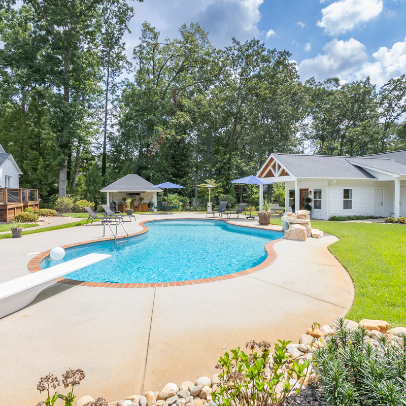 home overlooking a swimming pool