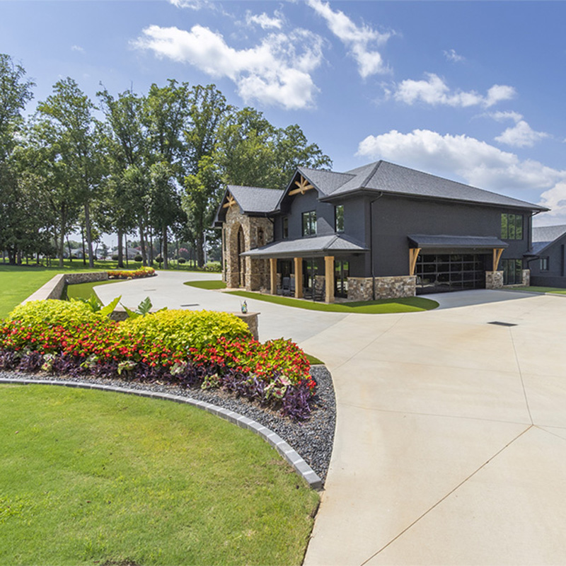 home with floral landscaping
