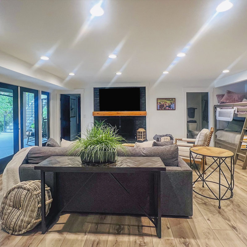 Family room renovation with cool fireplace by Mosteller Construction